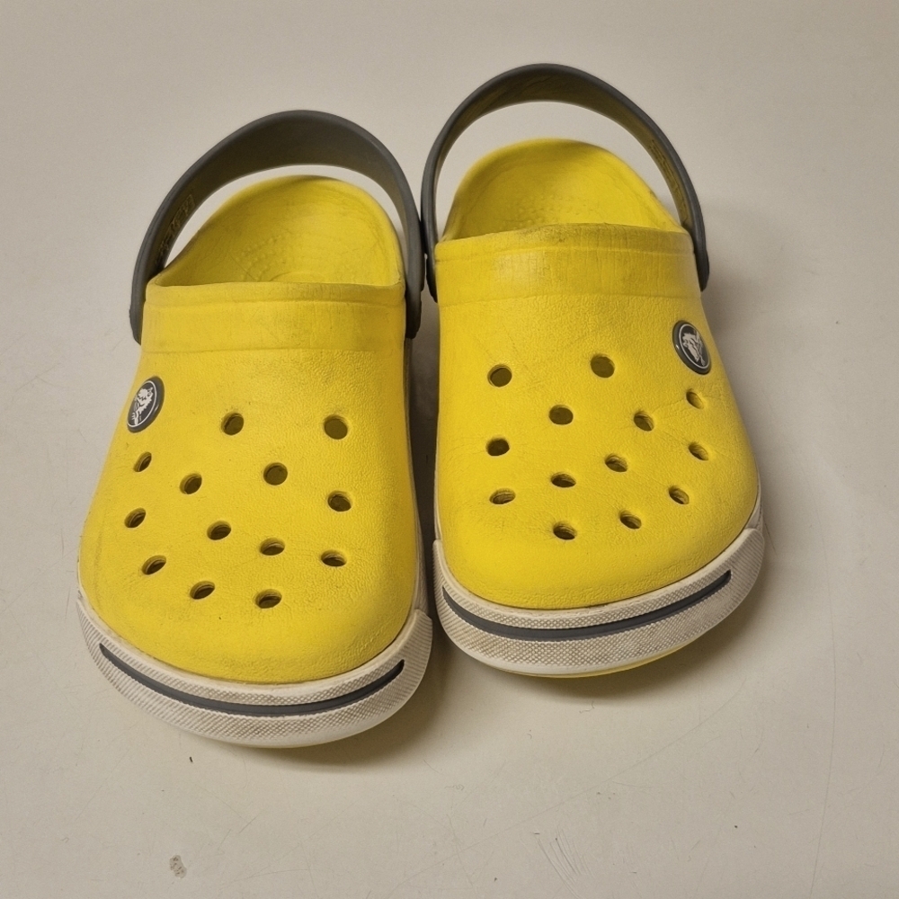 Crocs for toddlers in yellow, white, and gray color  Size 12 or 13